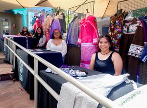 Emerging artist apprentices showcasing their work during the Santa Fe Indian Market.